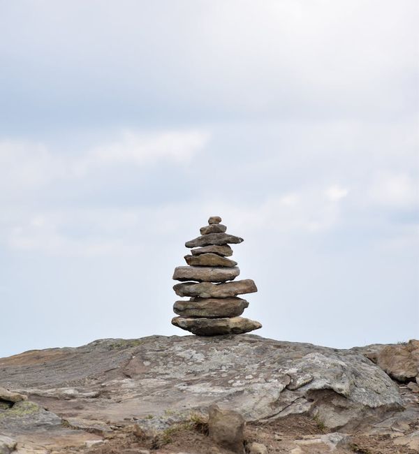 A serene landscape with balanced stones symbolizing inner peace.